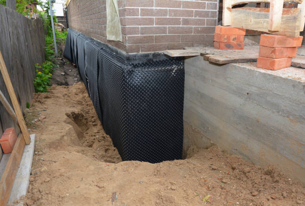 SJ Waterproofing Pros technician performing targeted Waterproofing assessment in Bell Buckle, TN